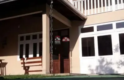 Casa com 5 quartos à venda na Avenida Fioravante Paschoalim, 105, Martim de Sá, Caraguatatuba