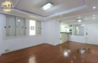 Apartamento semi-mobiliado, possui 3 dormitórios, sendo 1 suíte