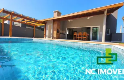 Locação por temporada | linda casa nova e moderna no condomínio mar verde
