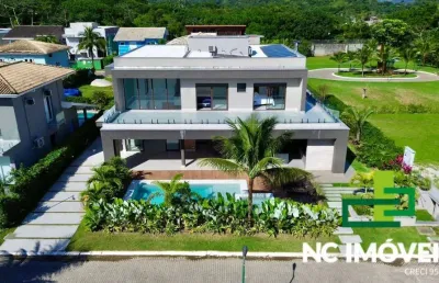 Locação por temporada | luxuosa casa em condomínio pé na areia.