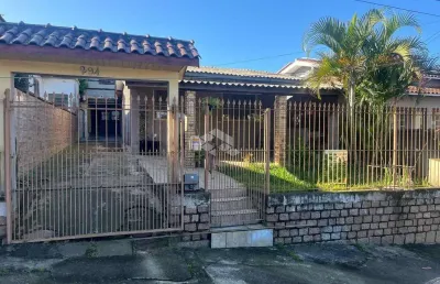 Casa com 4 quartos à venda na ariovaldo vieira de aguiar, 294, nossa senhora das graças, canoas por r$ 360.000