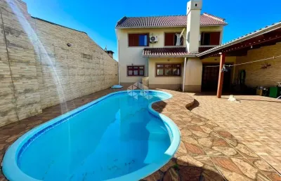 Casa com 3 quartos à venda na rua ernesto da silva rocha, 1254, estância velha, canoas por r$ 585.000