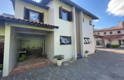 Casa em condomínio fechado com 3 quartos à venda na rua santa helena, 60, centro, canoas por r$ 595.000