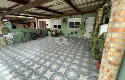 Casa em condomínio fechado com 2 quartos à venda na rua camboatás, 195, igara, canoas por r$ 285.000
