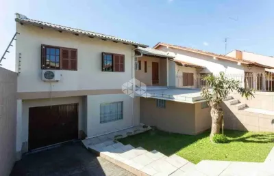 Casa com 3 quartos à venda na rua doutor osvaldo degrazia, 320, costa e silva, porto alegre por r$ 489.990