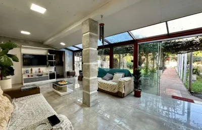 Casa com 4 quartos à venda na rua quinze de novembro, 186, nossa senhora das graças, canoas por r$ 1.350.000