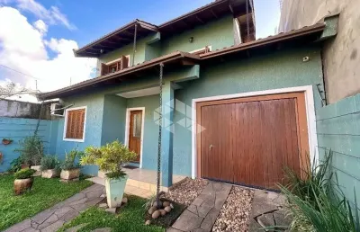 Casa com 3 quartos à venda na avenida açucena, 990, estância velha, canoas por r$ 844.000