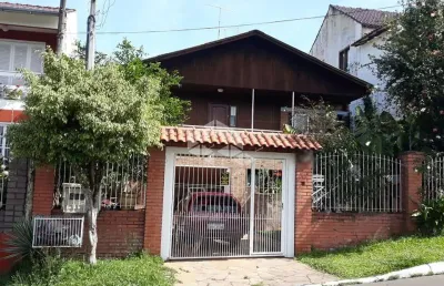 Casa com 4 quartos à venda na avenida doutor sezefredo azambuja vieira, 5729, olaria, canoas por r$ 639.000