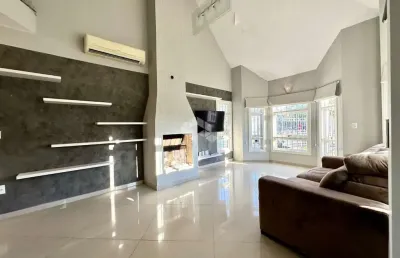 Casa com 4 quartos à venda na rua noruega, 111, marechal rondon, canoas por r$ 1.450.000
