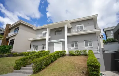Casa à venda com 4 suítes no condomínio tamboré 11.