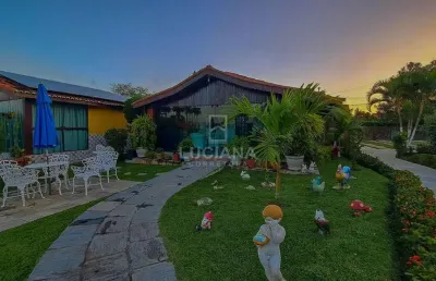 Ótima casa com 3 suítes em condomínio próximo da via local!