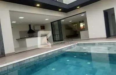 Sobrado à venda, 3 suítes, 4 vagas de garagem, área gourmet, piscina, churrasqueira, jardim residen