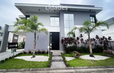 Casa com 3 dormitórios e suite em condomínio fechado em biguaçu/sc