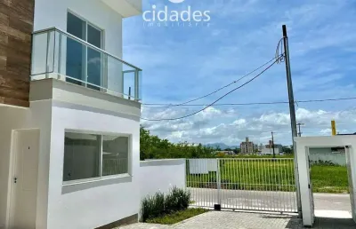 Excelente casa condomínio fechado para à venda no bairro nova palhoça