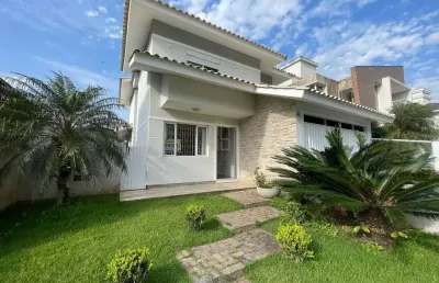 Casa com 3 dormitórios, suíte e área gourmet à venda na pedra branca - palhoça/sc