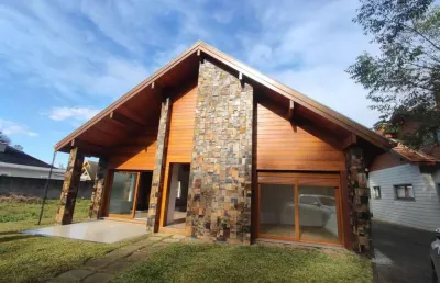 Casa 3 dormitórios à venda no bairro carniel com 271 m² de área privativa - 2 vagas de garagem