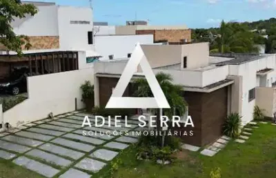 Alphaville litoral norte 2 - 4/4 sendo uma suíte - 202m² ac - 4 vagas - área verde - acabamento fino em porcelanato - piscina e área gourmet