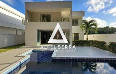 Alphaville litoral 3 - 4 quartos sendo 3 suítes - 2 lavabos - 4 vagas - piscina e área gourmet - sala ampla com pé direito duplo
