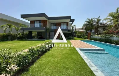 Busca ville - 910m² total - recém construída - 5 suítes - closets - climatização - área gourmet - piscina privativa - dependência completa - 6 vagas