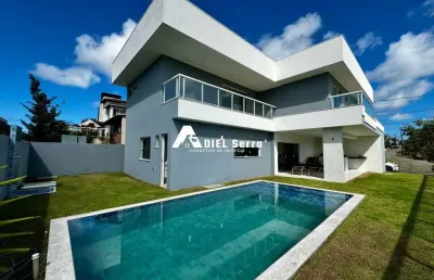 Alphaville litoral norte 2 - 415m² - porteira fechada - vista verde - 2 pavimentos - 4 suítes - piscina - espaço gourmet - armários - 3 vagas