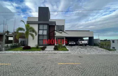 Casa em condomínio fechado com 4 suítes, escritório, piscina privativa