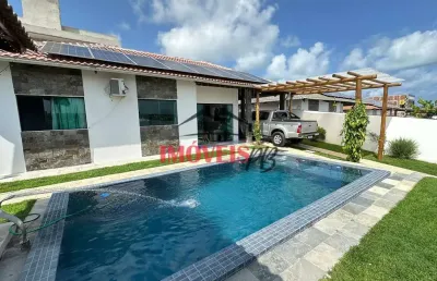Casa mobiliada na praia de carapibus com área de lazer e vista mar.