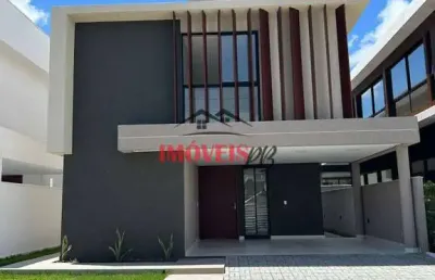 Casa em condomínio fechado, com alta sofisticação e conforto com 4 quartos