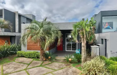 Casa em condomínio fechado com 4 quartos à venda na avenida paraguassu, 130, marina, xangri-lá por r$ 1.540.000