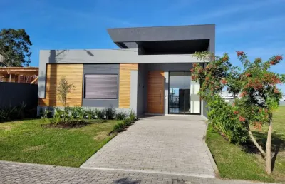 Casa em condomínio fechado com 4 quartos à venda na rua rio camisas, 10, centro, xangri-lá, 150 m2 por r$ 1.550.000