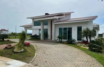 Casa em condomínio fechado com 7 quartos à venda na estrada do mar, 5990, green village golf club, xangri-lá, 508 m2 por r$ 3.500.000