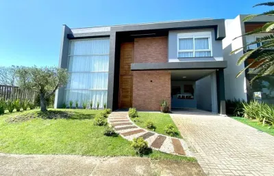 Casa em condomínio fechado com 4 quartos à venda na estrada do mar, 1200, parque antártica, capão da canoa, 251 m2 por r$ 3.200.000