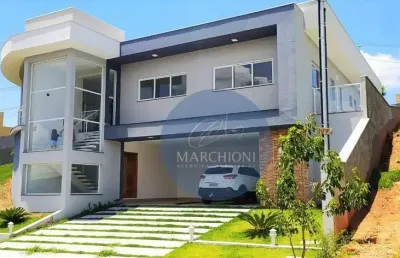 Casa de esquina com arquitetura contemporânea em condomínio de bragança paulista/sp