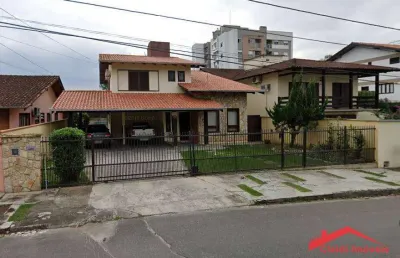 Casa com 3 dormitórios à venda, 286 m² por r$ 1.500.000,00 - costa e silva - joinville/sc