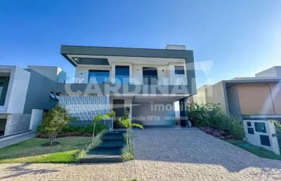 Casa à venda no condomínio alphaville dom pedro 3 com 4 suítes.