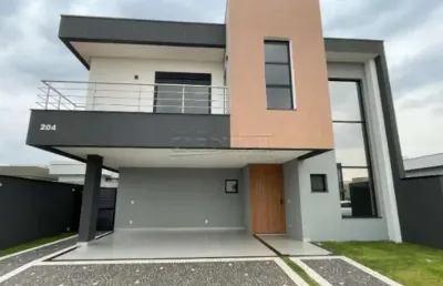Casa à venda no condomínio royal garden, paulínia com 4 suites.