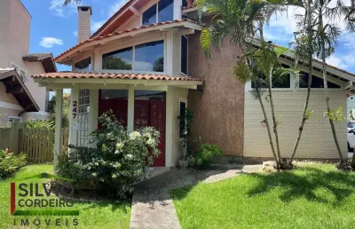 Casa em condomínio fechado com 4 quartos à venda na rua liberato carioni, 247, lagoa da conceição, florianópolis por r$ 3.000.000