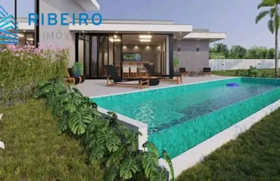 Linda casa a venda, são 4 suítes 257m de construção. pé direito duplo, quadra de beach tennis piscina 13m aquecida