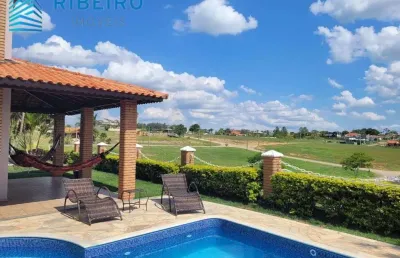 Bela casa de campo em condomínio com total infraestrutura