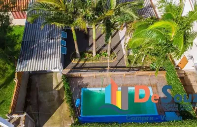 Imóvel  com piscina e pergolado  próximo ao centro de nova tramandai!