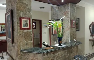 Bertioga-mansão 2 piscinas 4 suites 4 salas varanda casa caseiro
