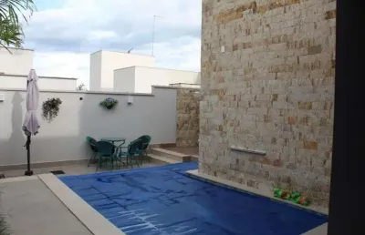 Casa térrea com 4 suítes plenas no alphaville flamboyant araguaia