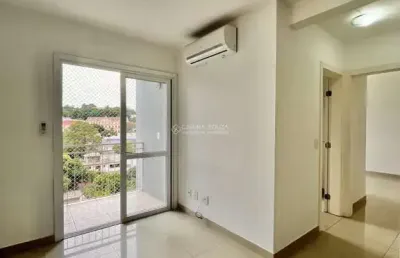 Apartamento no bairro vila nova em novo hamburgo: 2 dormitórios, semimobiliado, sacada, 1 vaga, segurança 24hrs.