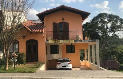 Casa à venda com 5 dormitórios, piscina aquecida, no condomínio aruã em mogi das cruzes - sp