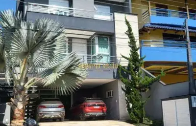 Sobrado de alto padrão à venda com 3 dormitórios e com elevador no condomínios aruã - mogi das cruzes - sp.