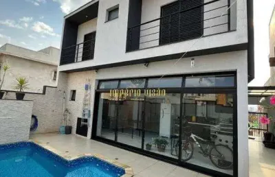 Sobrado à venda com 3 suítes, sala de cinema, área gourmet com churrasqueira e piscina no condomínio mosaico essence - cezar de souza-sp.