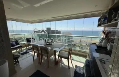Apartamento mobiliado com 1 suíte, vista mar, varanda gourmet e 3 vagas de garagem soltas em armação.