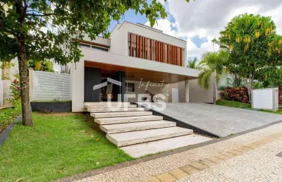 Alphaville araguaia - casa de condomínio 5 quartos, sendo 5 suítes
