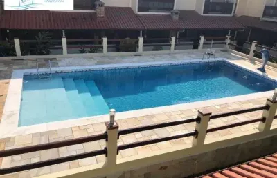 Casa em condomínio fechado com 3 quartos para alugar no Indaiá, Caraguatatuba 