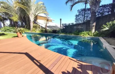 Casa em condomínio fechado com 4 quartos à venda no Cacupé, Florianópolis 