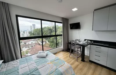Loft finamente mobiliado com garagem em condomínio completo